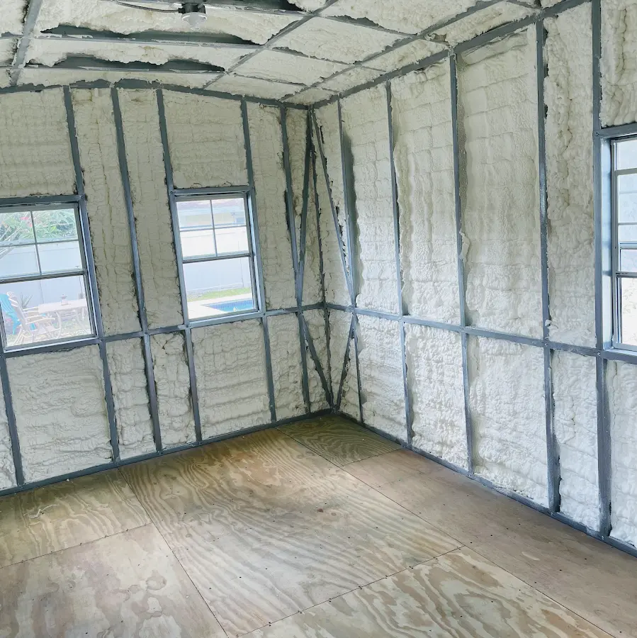 Closed-cell spray foam insulation applied to wall cavities in a residential project in Black Jack